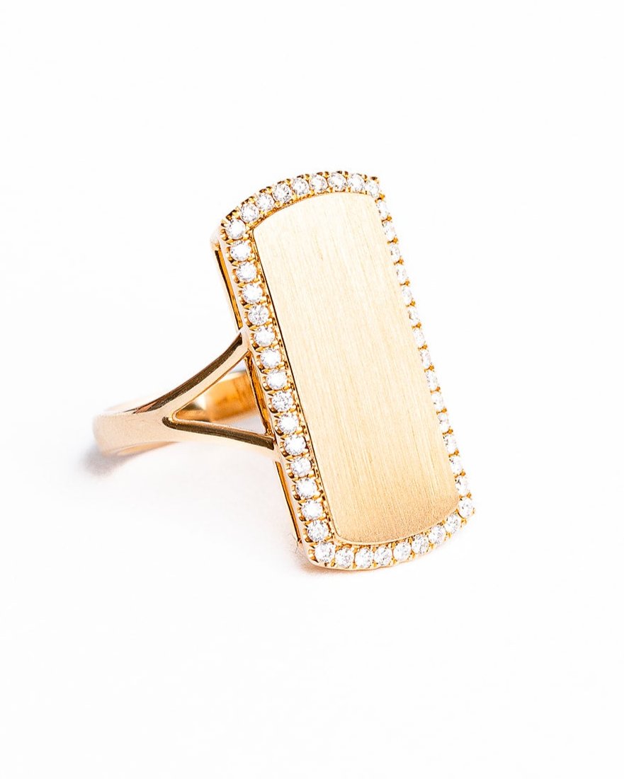 The Dylan James Jewelry TWILA Diamond Ring, size 7, features a gold band with a wide rectangular top bordered by small diamonds, set against a white background.