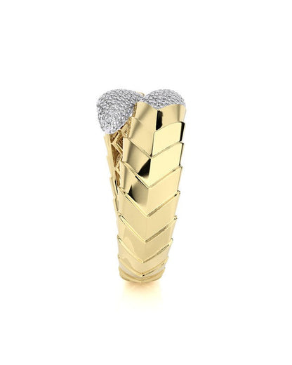Gold ring with diamond-studded top on a white background