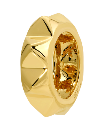 Gold ring with geometric design on a white background