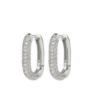 The JESS Huggies by Luv AJ are elegant oval-shaped hoops, gold-plated and beautifully encrusted with small cubic zirconia stones.