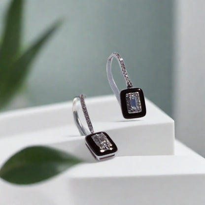 14kt whote gold diamond and black enamel earrings  @dylanjamesjewelry.com