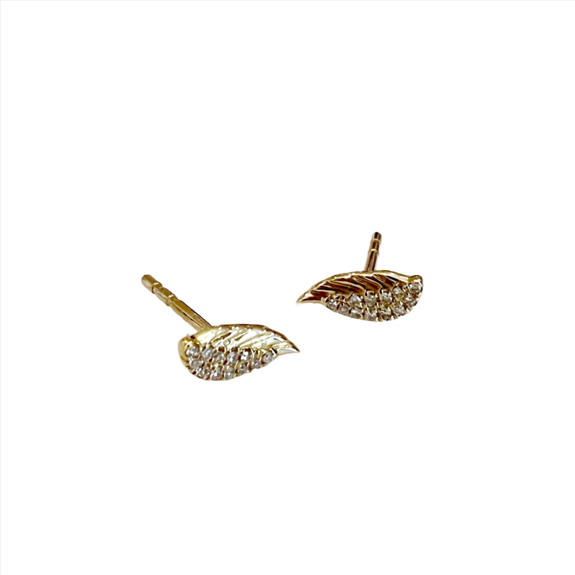 yellow gold diamond feather stud earrings  @dylanjamesjewelry.com