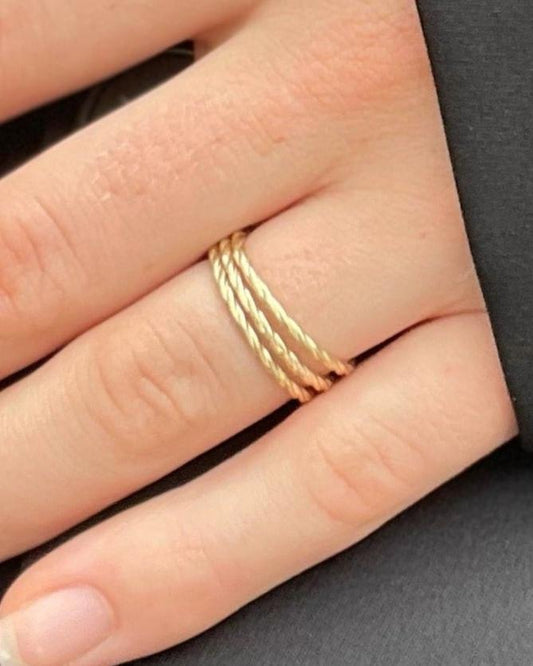 yellow gold twisted thin band ring  @dylanjamesjewelry.com