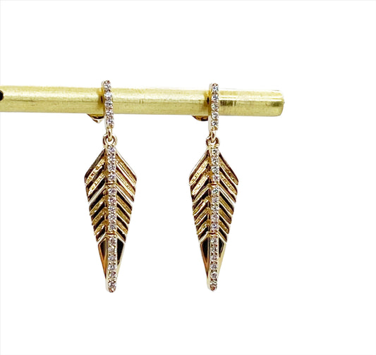 yellow gold diamond feather hanging earrings  @dylanjamesjewelry.com
