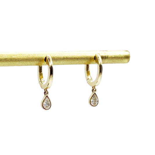 yellow gold hoop earrings with pear shape diamond drops  @dylanjamesjewelry.com