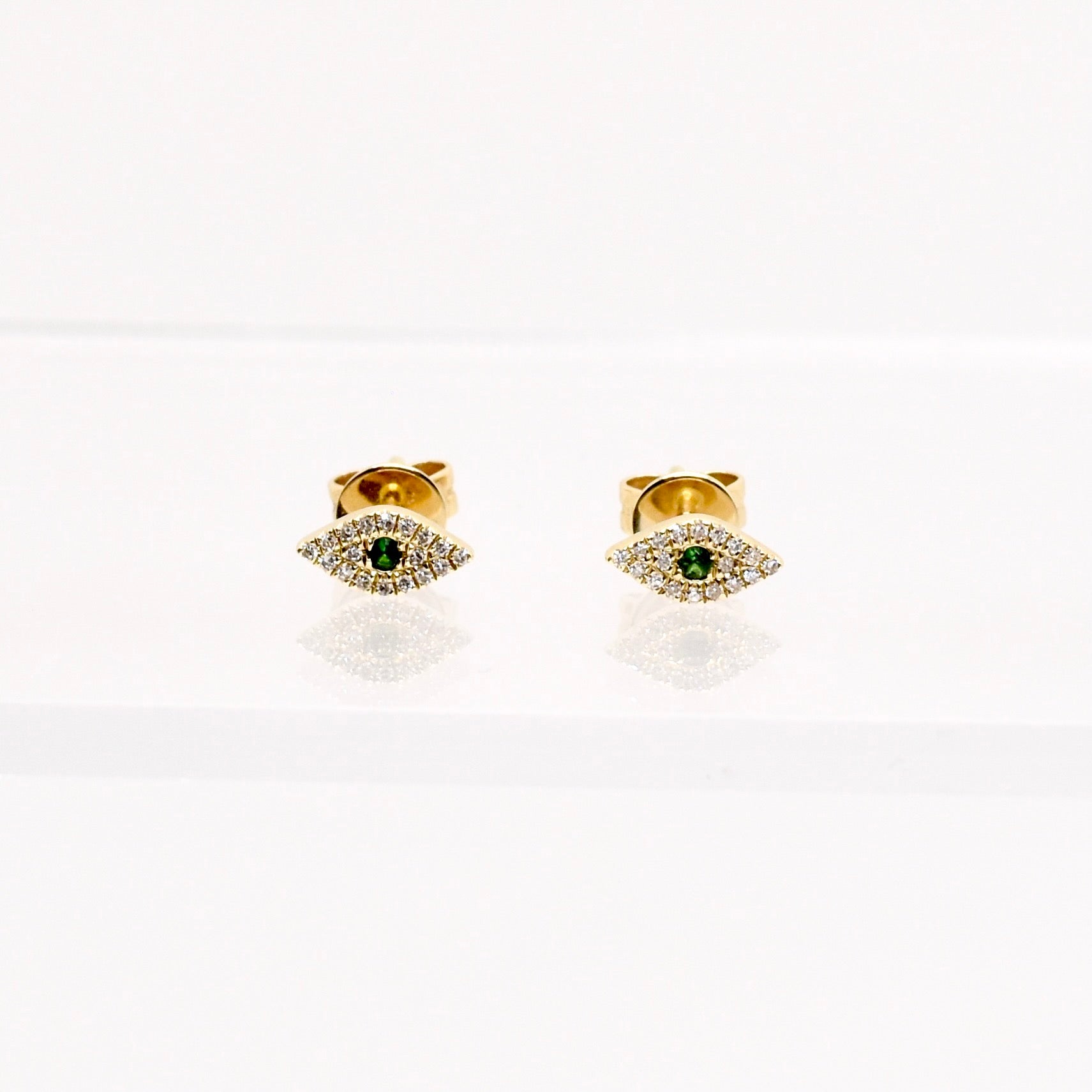 gold diamond emerald evil eye stud earrings @dylanjamesjewelry.com