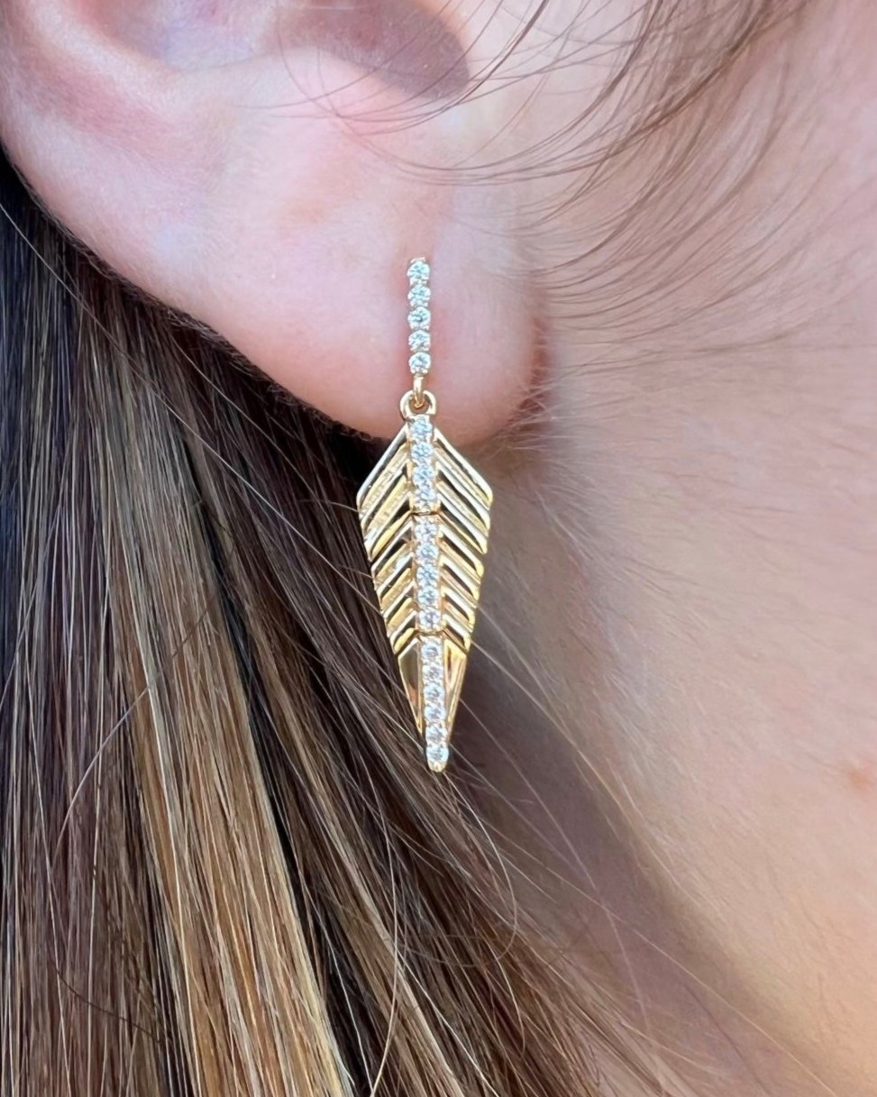 gold diamond feather hanging earrings @dylanjamesjewelry.com